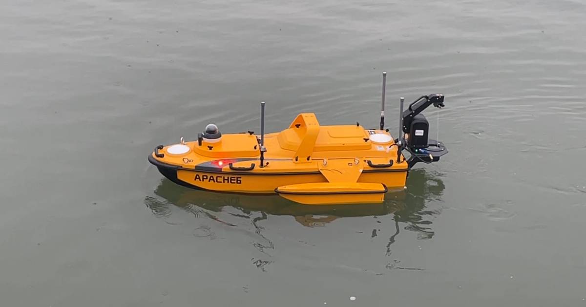 Convex Geomatics USV conducting a bathymetric survey on an Alberta river — remote-operated hydrographic mapping from shore
